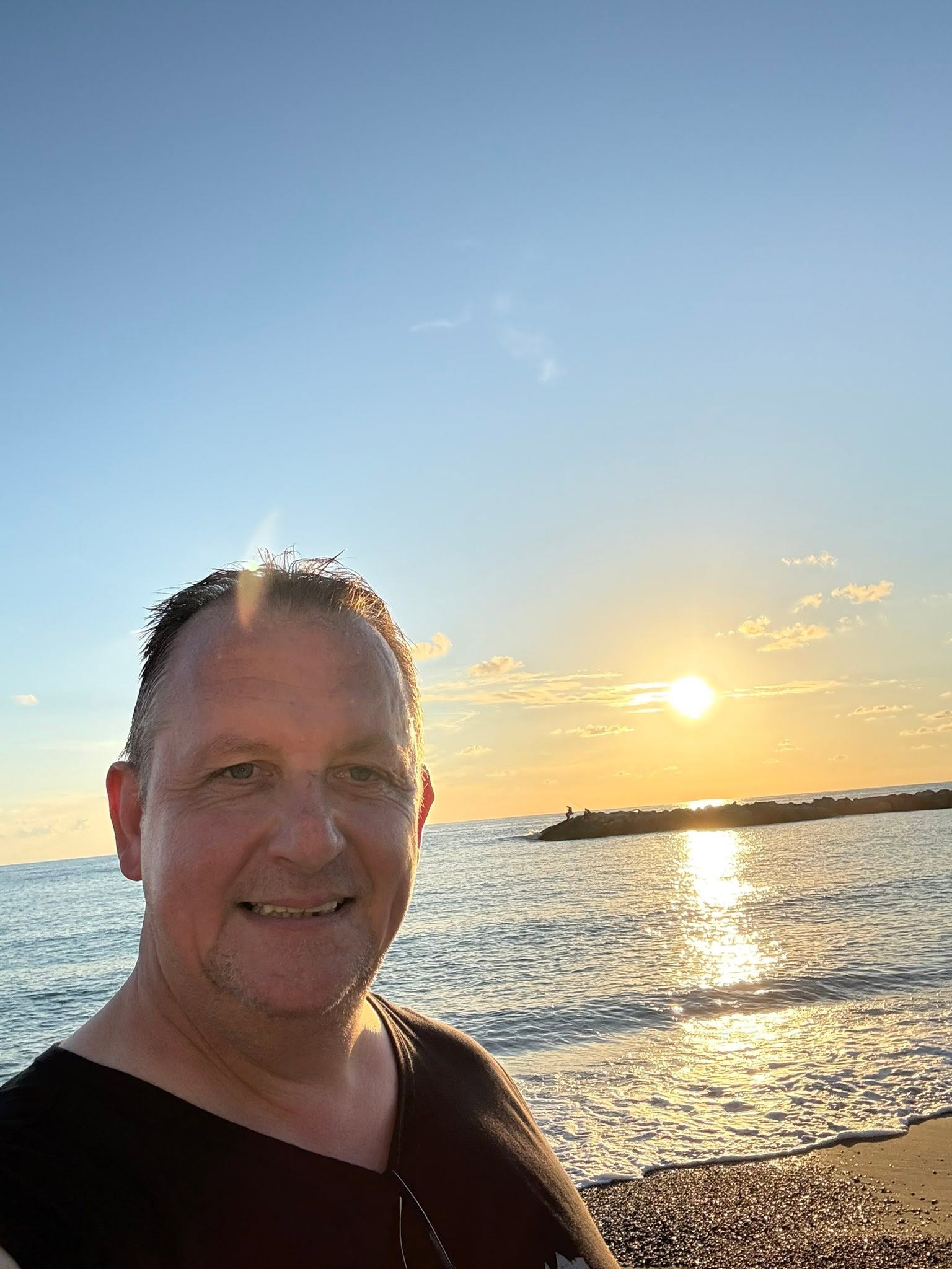 Sonnenuntergang am Meer mit Tourguide